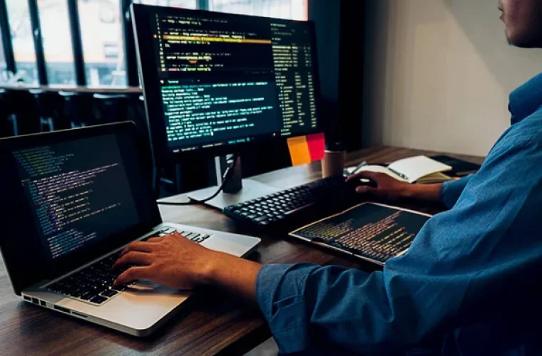 depositphotos_243120806-stock-photo-programmer-working-software-development-coding